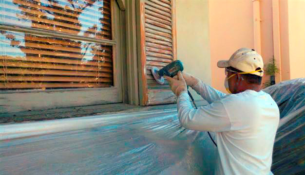 Sanding windows of an apartment building - Los Angeles